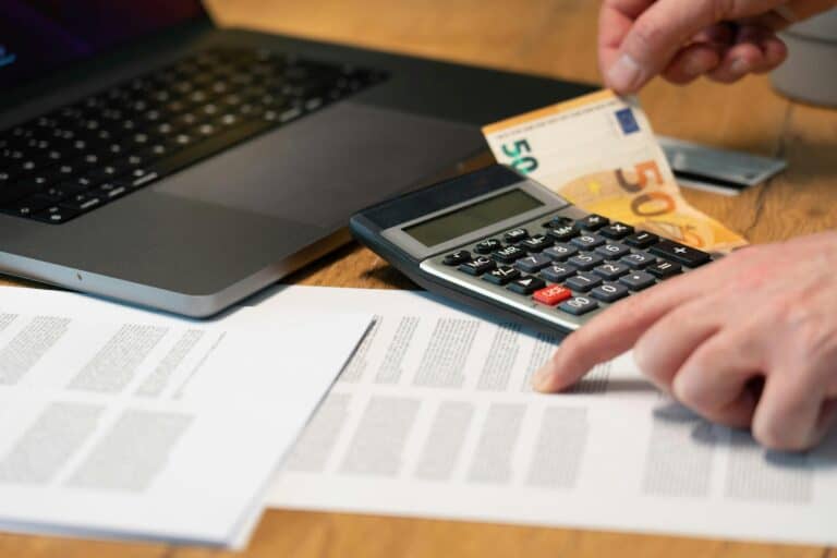 Photo by Jakub Zerdzicki: https://www.pexels.com/photo/man-hands-over-documents-and-calculator-16823695/